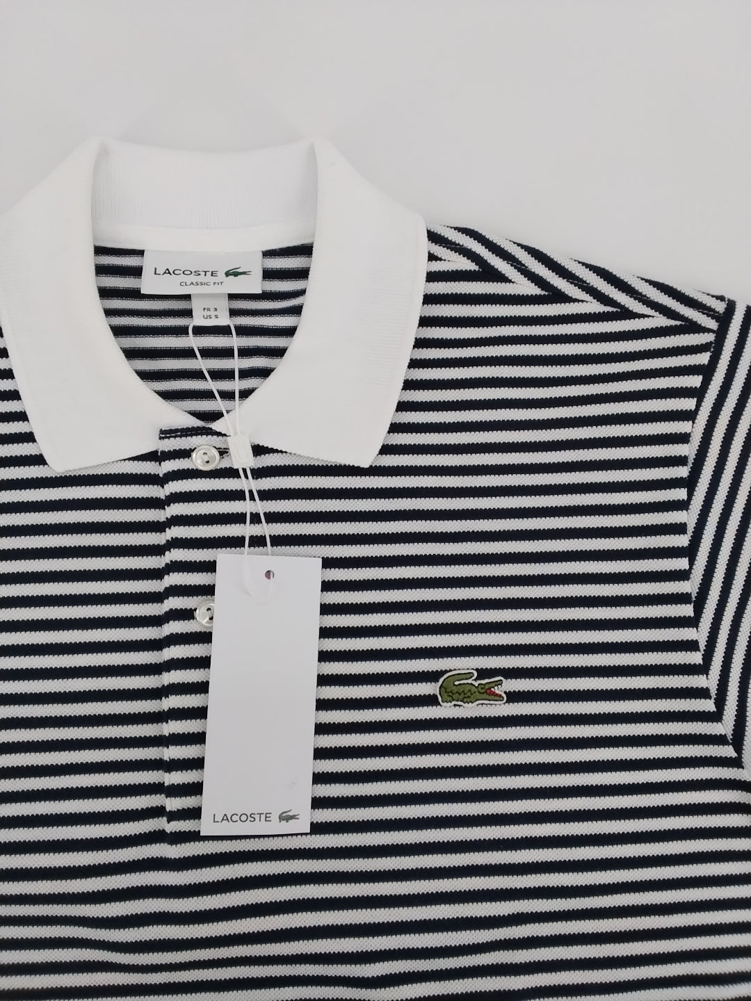 Polo Lacoste  Classic fit Righe bianco blu
