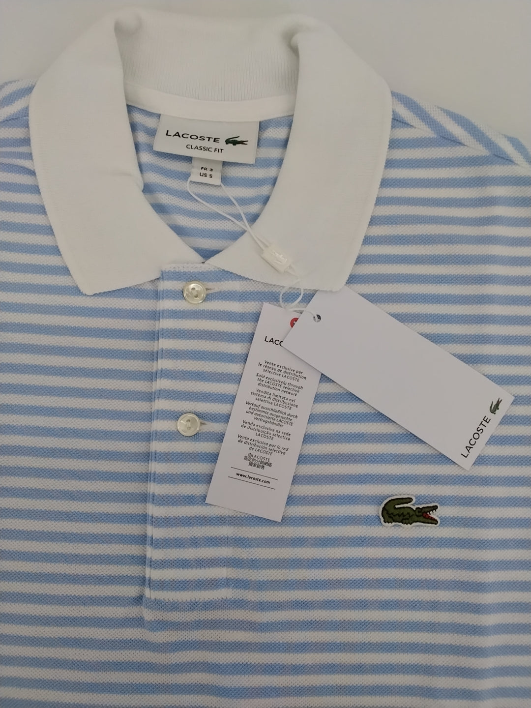 Polo Lacoste  Classic fit Righe bianco celeste